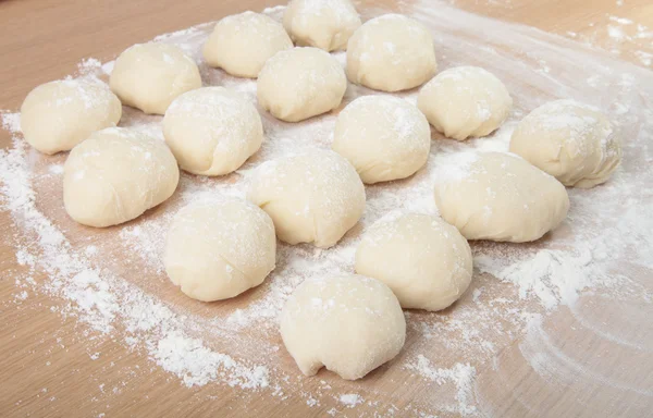 Small balls of dough with flour for pizza or cakes and scones. S — Stock Photo, Image