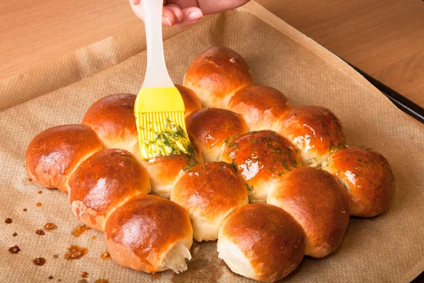 Freshly baked rolls smeared garlic butter and dill — Stock Photo, Image