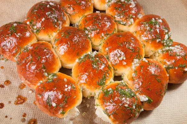 Freshly baked rolls smeared garlic butter and dill — Stock Photo, Image