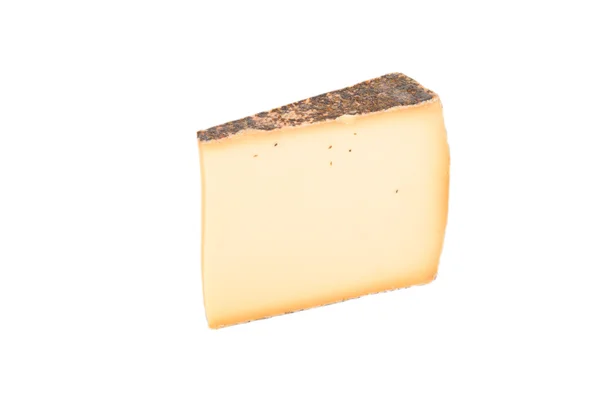 Швейцарский сыр, выпеченный со специями на белом фоне . — стоковое фото