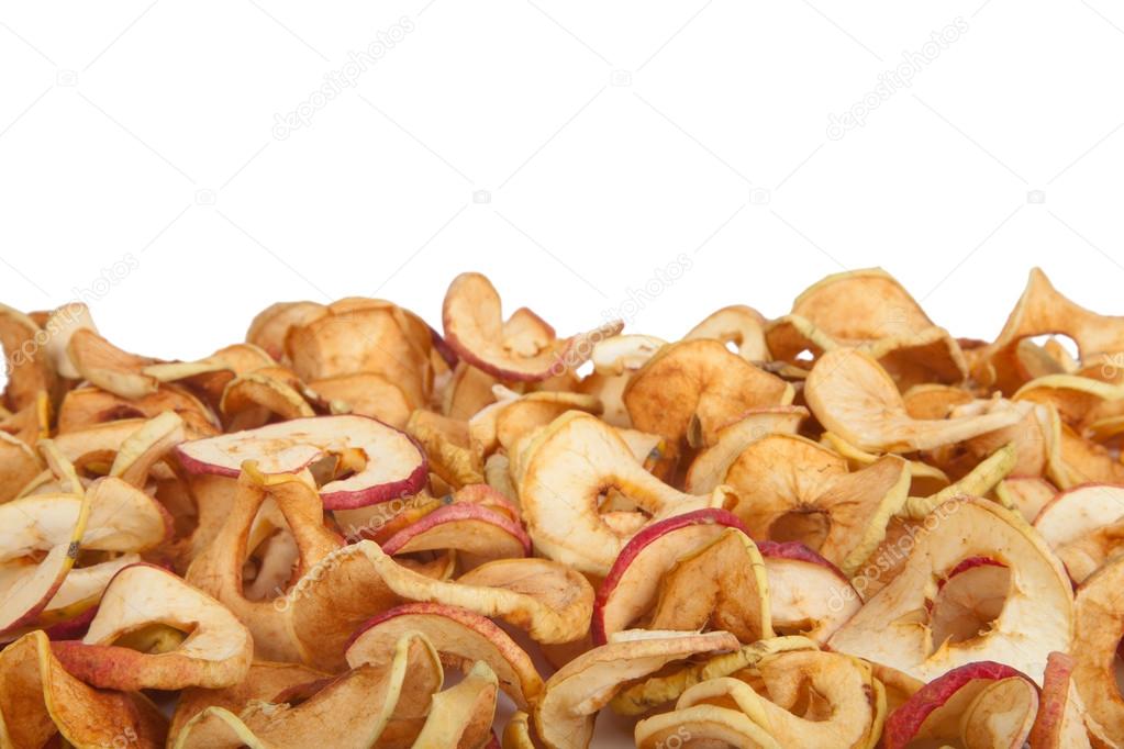 scattered dried apples isolated on white background.