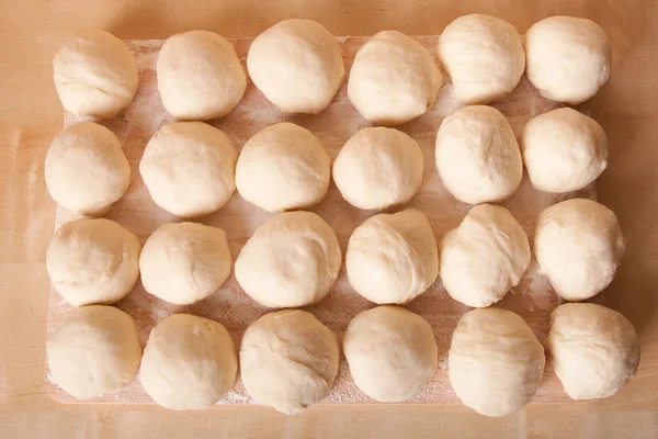 Small balls of dough with flour for pizza or cakes and scones. S — Stock Photo, Image