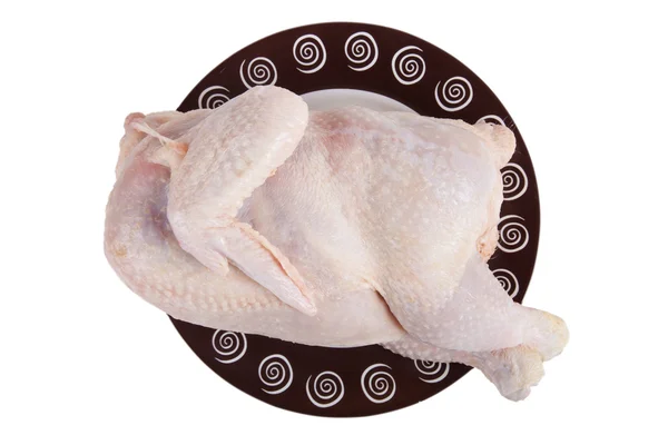 Bontott csirke egy tányérra, elszigetelt fehér background — Stock Fotó