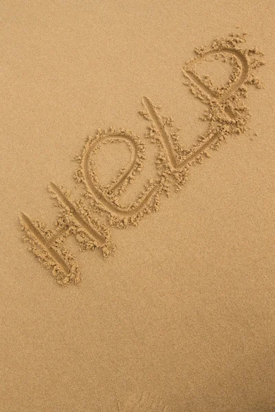 Help - Inscription on the sand of tropical beach — Stock Photo, Image