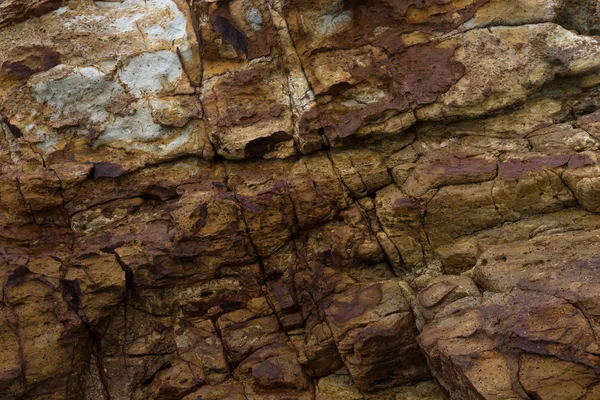 Las piedras naturales se doblan en la pared. Contexto . — Foto de Stock