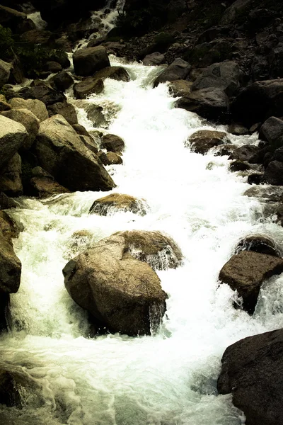 Stream of mountain river. Toned. Dramatic — Stock Photo, Image