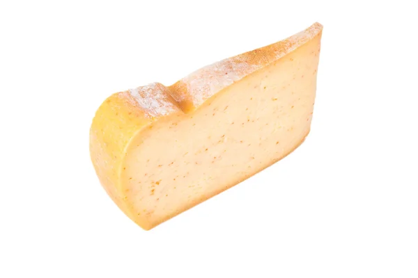 Pedazo de queso triangular aislado sobre un fondo blanco —  Fotos de Stock