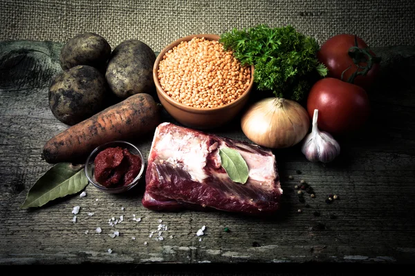 Ingredients for Turkey vegetable soup with red lentils, lying on — Stock Photo, Image