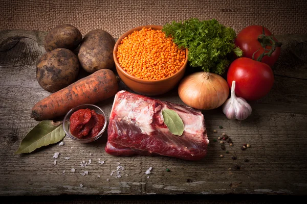 Ingredients for Turkey vegetable soup with red lentils, lying on — Stock Photo, Image