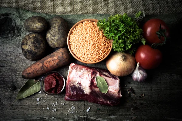 Ingredients for Turkey vegetable soup with red lentils, lying on — Stock Photo, Image