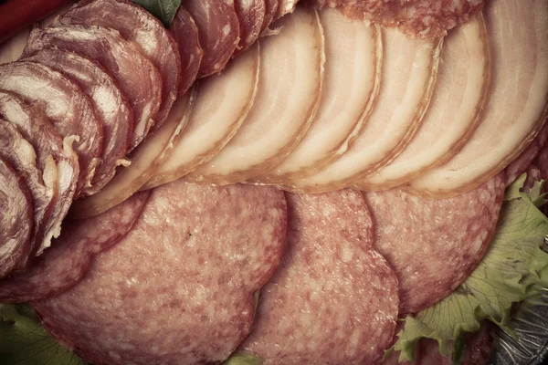 The background - detail of sliced salami — Stock Photo, Image