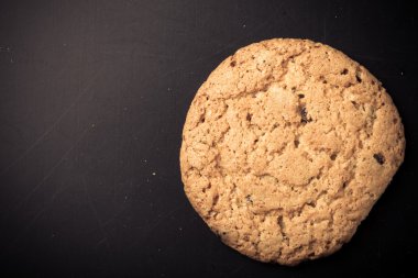 Eski püskü arka planda yulaf kurabiye. renkli. alan ile