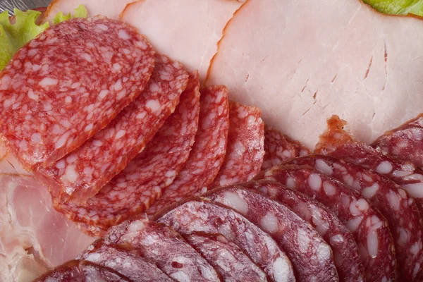 Lo sfondo - dettaglio di salame affettato — Foto Stock