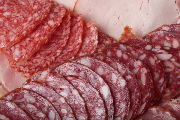 The background - detail of sliced salami — Stock Photo, Image