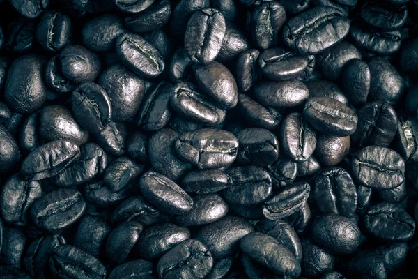 Ziarna kawy tło. przyciemniane — Zdjęcie stockowe