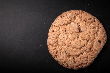 Eski püskü arka planda yulaf kurabiye. renkli. alan ile