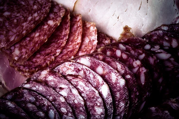 The background - detail of sliced salami — Stock Photo, Image