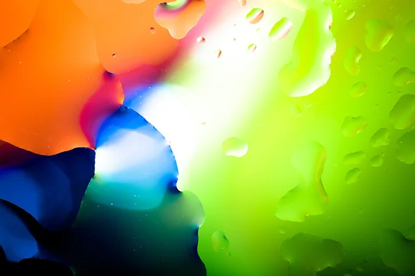Närbild på luftbubbla med färgstarka bakgrund — Stockfoto