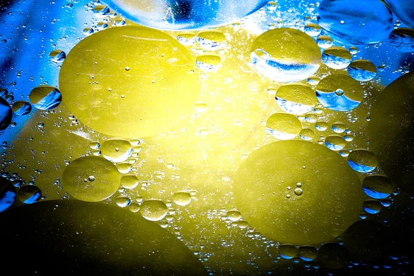Gyönyörű absztrakt színes háttér, olaj, a víz felszínén — Stock Fotó
