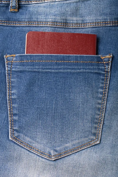 The pocket of jeans with document. Cloth background — Stock Photo, Image