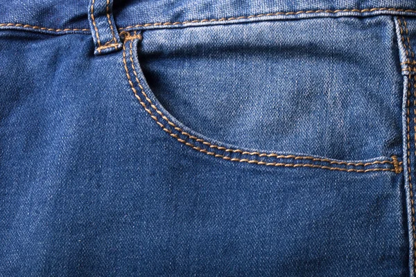 Fickan på jeans. Trasa bakgrund — Stockfoto