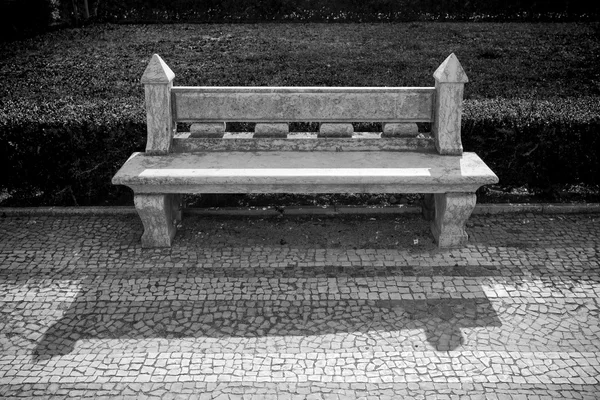stone bench in a city park. Garden architecture. tinted