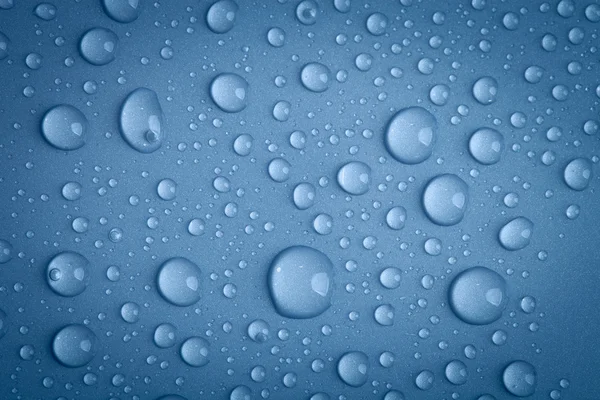 Drops of water on the colored background — Stock Photo, Image