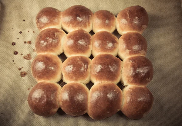 Freshly baked rolls only taken out of the oven. Toned — Stock Photo, Image
