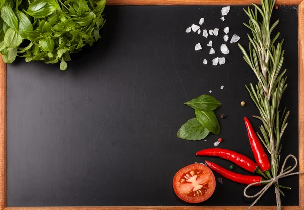 Herbs and spices. basil, red pepper, salt and rosemary on a blac — Stock Photo, Image