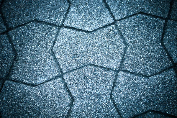 Тротуарная плитка из натуральных камней. Фон. Toned — стоковое фото