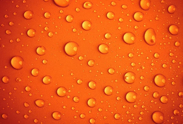 Water drops background. Toned — Stock Photo, Image