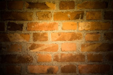 Kırmızı tuğla duvar. Arka plan. Tonda turuncu