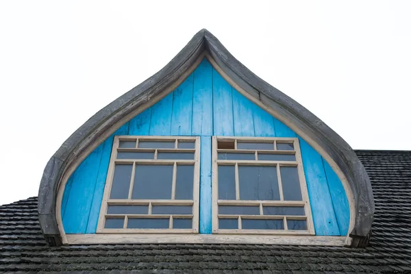 Window on an old wooden roof — Stock Photo, Image