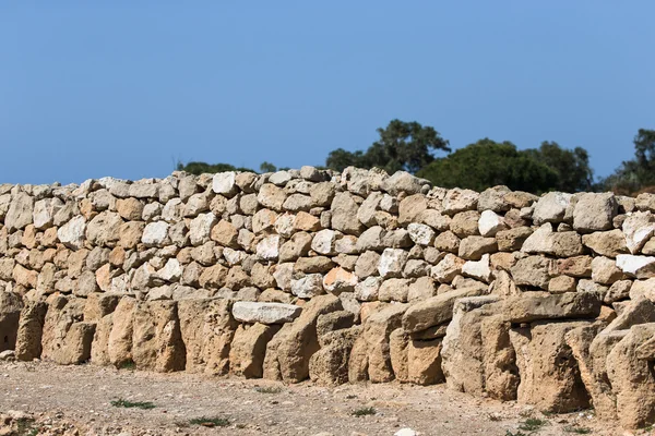 Cerca construída de pedra natural — Fotografia de Stock