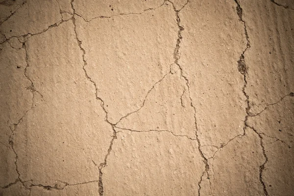 Cracked dry land. Natural background. Toned — Stock Photo, Image