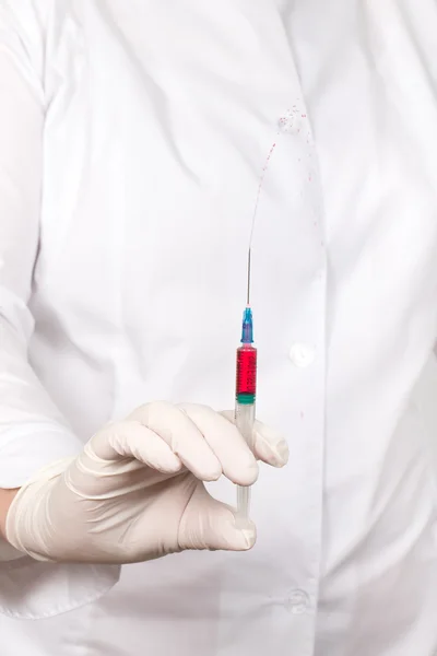 Doctor holds syringe with injection — Stock Photo, Image