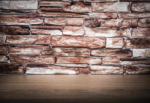 Wooden table and stone wall. Background. The edges are darker. — Stock Photo, Image