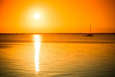 Beautiful sunset picture in Key Largo, Florida, USA. Toned clipart
