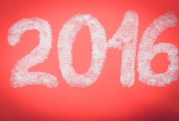 Gula dalam bentuk angka 2016 latar belakang kertas merah. Christma — Stok Foto