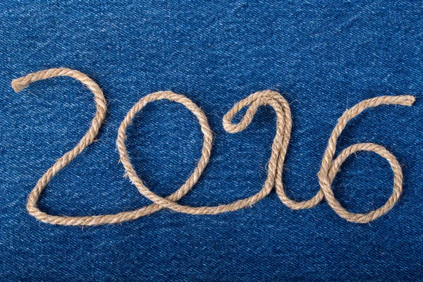 The number 2016 of rope on the background of the front of the je — Stock Photo, Image