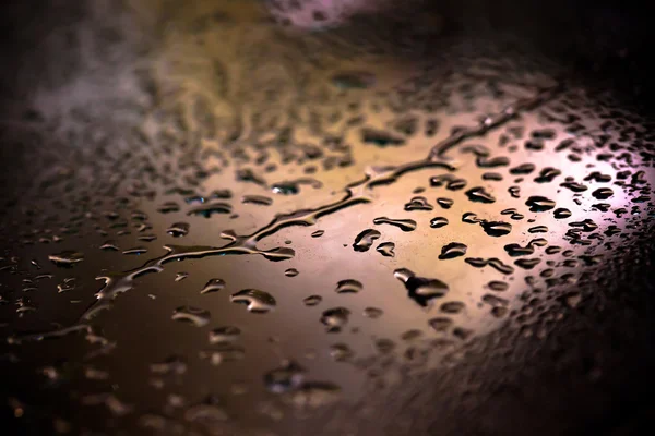 Drops of water on a color background. Shallow depth of field. Se — Stock Photo, Image