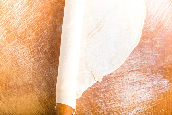 Process of preparing of lagman or pizza. Raw dough on old light — Stock Photo, Image