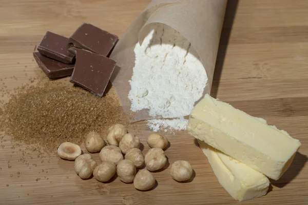 Ingredients for baking on light wooden table like background. Se — Stock Photo, Image