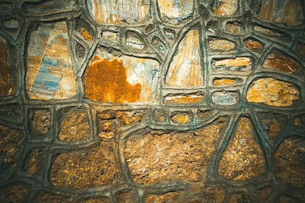 石のテクスチャ壁や自然素材の bac のフェンスの一部 — ストック写真