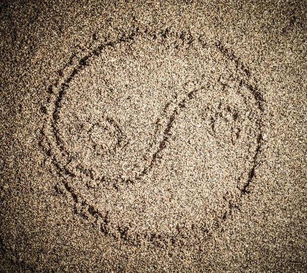 Yin Yang symbol on a natural background of large sand or small p — Stock Photo, Image