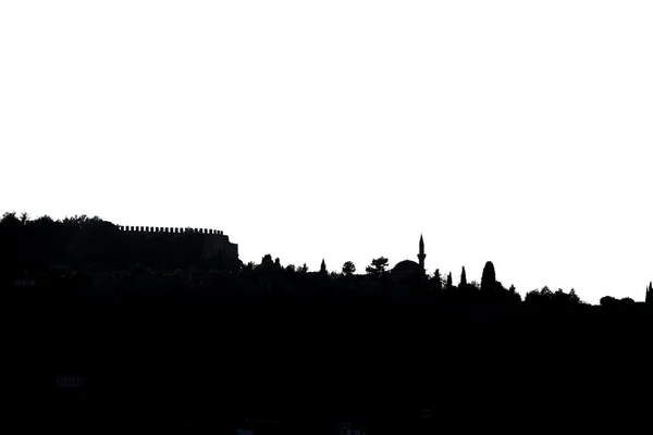 Temná silueta Alanya poloostrova na světlém pozadí — Stock fotografie