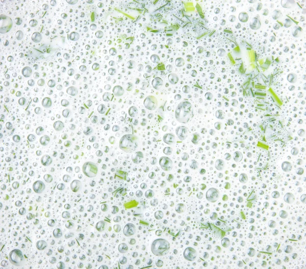 Texture di panna acida frullata con erbe — Foto Stock