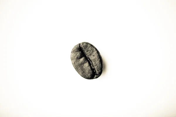 Des grains de café sur fond blanc. tonique — Photo