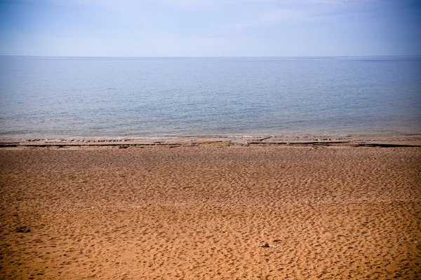 Sandy beach and clouds. Sunset in Turkey. Toned — Stock Photo, Image