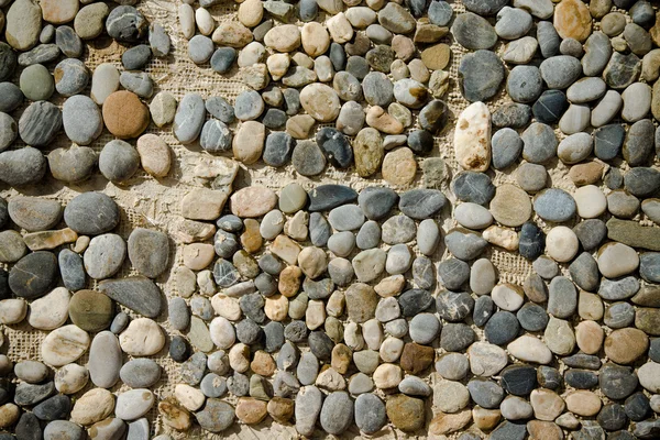 Natural pebble texture for background. Toned — Stock Photo, Image